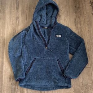 Color navy by the north face. For kids